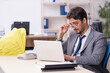 © Elnur - Young male employee looking after new born at workplace