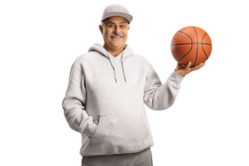 Poster - Smiling mature man holding a basketball