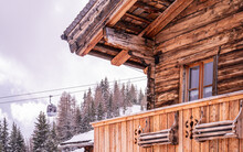 Wooden Mountain House And Ski Lift In Rauris, Austria