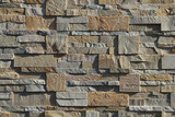 Fototapeta  - Mur en pierres de tailles différentes