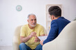 © Elnur - Old man visiting young male psychotherapist