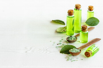 Essential oil of tea tree with fresh green leaves