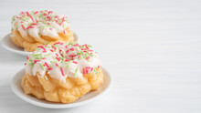 French Cruller Pastry On White Table With Copy Space