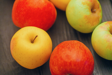 Wall Mural - Beautiful multi-colored apples on the table