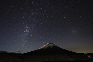 Sticker - Beautiful view of a mountain with a snowy peak under a starry sky