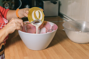 Poster - Woman preparing sponge cake.