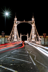 Poster - Vertical shot of the octagonal toll booths on Albert Bridge. London, UK.