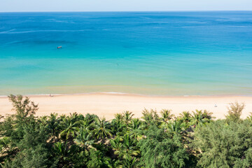 Aerial drone top down view crowd of people at tropical Beach with sunset in Phuket Thailand, Beautiful Phuket beach is famous tourist destination at Andaman sea Top view happy people play on the beach