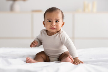 Wall Mural - Portrait of sad African American baby crying alone