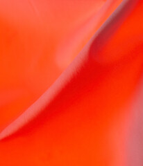 Canvas Print - Red fabric material as an abstract background.