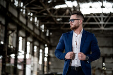Fashion Photo Shooting Of A Man In Elegant Formal Clothes. Young Successful Rich Guy Wearing Sunglasses Looking Away. Close Up