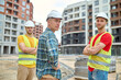 © zinkevych - Engineer and two workers looking at camera