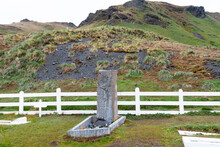 Southern Ocean, South Georgia, King Edward Cove, Grytviken, Grytviken Whaling Station. Sir Ernest Shackleton's Grave Site In The Cemetery At Grytviken.