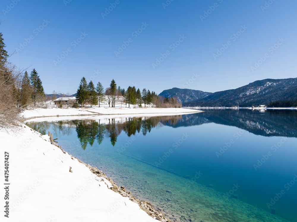Lake Walchensee near village Einsiedl in the snowy Bavarian Alps. Germany, Bavaria