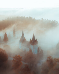 Canvas Print - Aerial view of mist-clad Marburg town in Germany