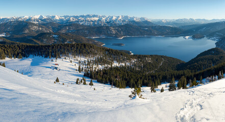 Wall Mural - View towards lake Walchensee and the Karwendel mountain range. View from Mt. Jochberg near lake Walchensee during winter in the Bavarian Alps. Germany, Bavaria