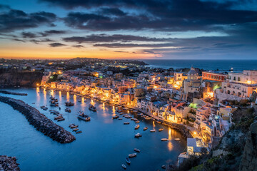 Poster - Europe, Italy, Procida. Overview of city and Marina Corricella at sunset.