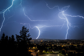 Wall Mural - lightning in the sky over the city