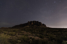 Beautiful Shot Of A Natural Landscape With Cacti Near The Arizona Superstition Mountains At Night