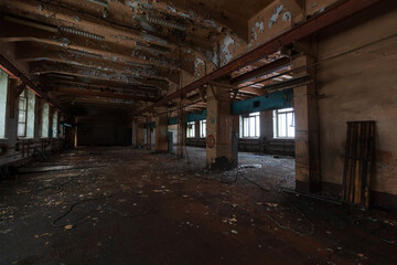 Wall Mural - dark room of an abandoned building with windows