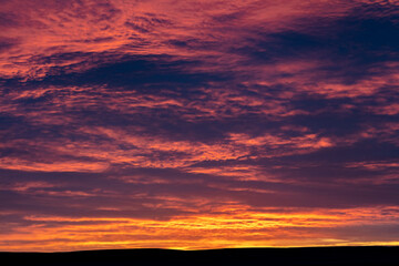 Wall Mural - Sunrise skies from Freezeout Lake Wildlife Management Area looking to prairie near Choteau, Montana, USA