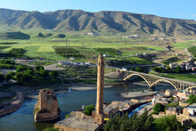 Turkey. Hasankeyf Village (Southeastern Anatolia). Aerial View From The Fortress On The Tigris River With Remains Of The Old Bridge (broken Arches And Pylons)