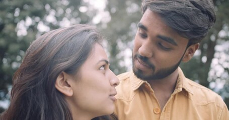 Canvas Print - The footage of a lovely couple celebrating their anniversary in a park in India