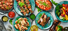 Food Background. Set Of Traditional Turkish And Oriental Cuisine. Set Of Meat And Vegetable Dishes In Plates. Top View. On A Stone Background.