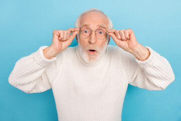 Sticker - Photo of impressed aged beard man look wear eyewear white turtleneck isolated on blue color background