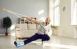 © Studio Romantic - Good thing I'm alive. Happy funny optimistic man with multiple physical injuries after car crash or domestic accident holding crutch and giving thumbs-up showing how he's enjoying sick leave at home
