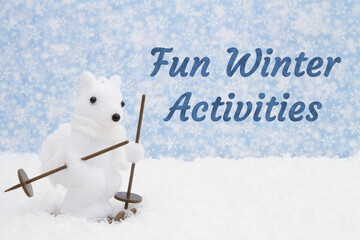 Wall Mural - Fun Winter Activities message with a happy squirrel skiing and snow