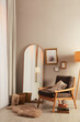 © New Africa - Stylish room interior with large mirror and comfortable armchair