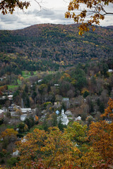 Wall Mural - View of a village in the autumn season