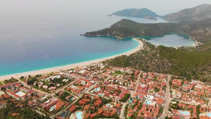 Wall Mural - Aerial drone view to Oludeniz village resort and lagoon Turkey