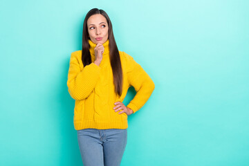 Poster - Photo of thoughtful unsure lady dressed yellow pullover arm chin looking empty space isolated teal color background