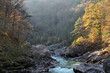Autumn landscape of granite canyon with mountain river