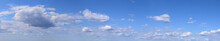 Beautiful Cloudiness, Variety In Light, Cold And Dark Colors Against The Blue Sky.
Panoramic Photograph Of An Atmospheric Phenomenon, Concentration Of Water Particles In The Form Of Vapor.