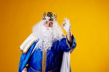 The Magician King Making The Ok Gesture On A Yellow Background