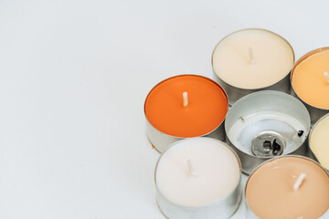 Canvas Print - Closeup of decorative candles on a white background