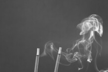 Close Up Of Incense Smoke On Black Background