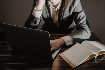 Canvas Print - High angle shot of a busy businessman working at his desk