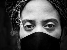 Grayscale Shot Of A Female Wearing Mask And Handkerchief. Cuba