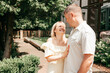 © Татьяна Волкова - Happy married couple on vacation enjoys each other on summer day. Summer holidays. Recreation and adventures. Life insurance. Role model. Family. Happy together.