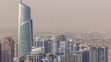 Jumeirah Lakes Towers District With Many Skyscrapers Along Sheikh Zayed Road Aerial Timelapse.