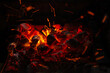 © Oleg - Sparks of fire on a black background. flame of fire with sparks. Burning red hot sparks fly from hot coals in the fire. Beautiful abstract background on the theme of fire, light and life.