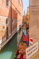 Wall Mural - Narrow canal, St Mark tower, Gondola in Venice, Veneto, Italy