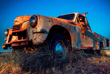 Old Rusty Abandoned Car With A Respirator Mask