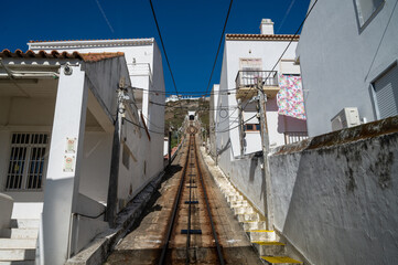 Wall Mural - Railway going along the streets of Nazare, Portugal