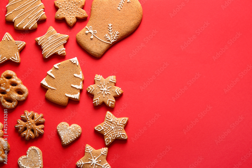 Different gingerbread cookies on red background