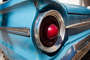 Sticker - Closeup shot of a vintage car headlight